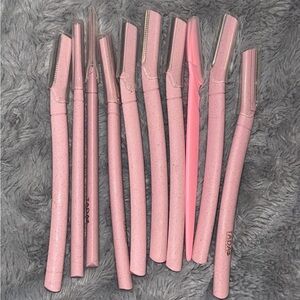 Brand new bundle of 10 Dermaplane razors. Brand new. Never used. Not in package.